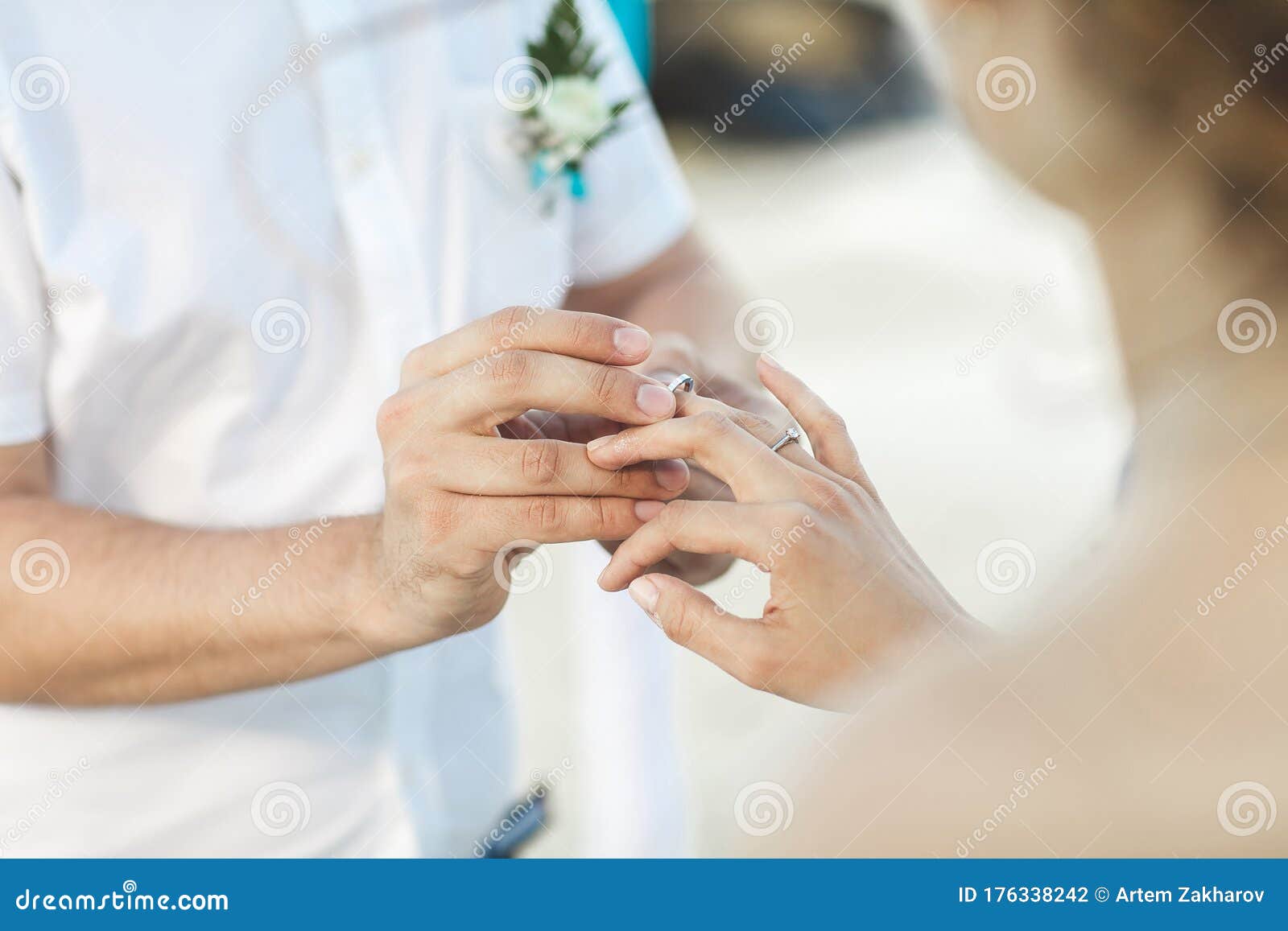 Groom Putting a Ring on Bride`s Finger during Wedding Ceremony. Stock