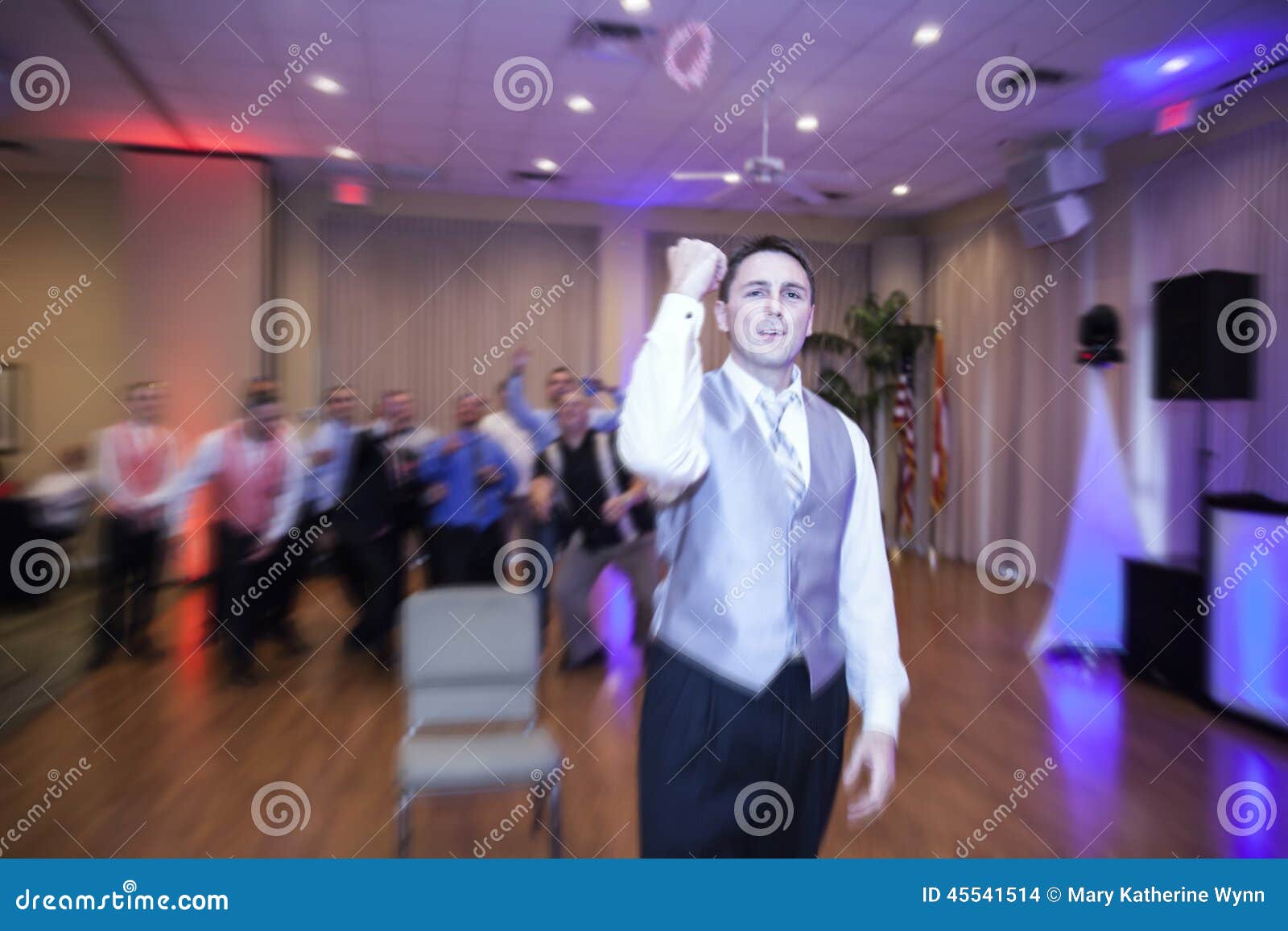Groom tossing garter stock photo. Image of young, throw 45541514