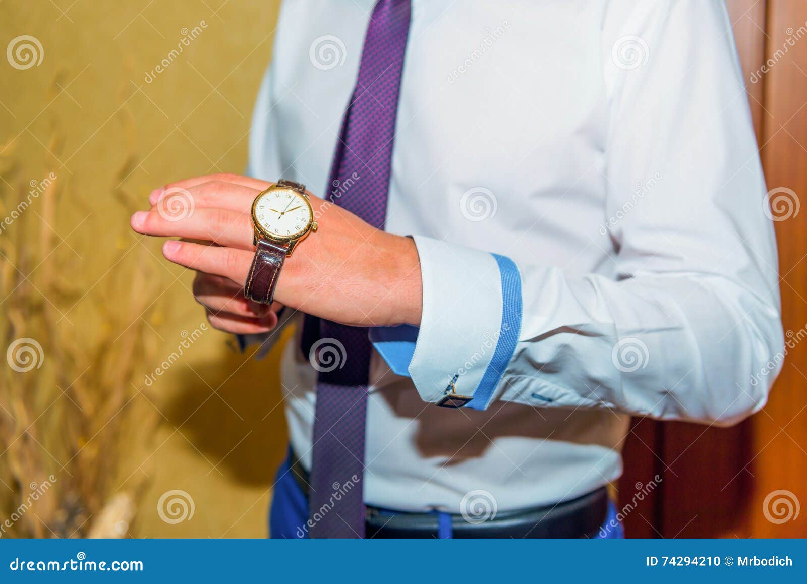 Groom wear watch on hand stock photo. Image of beauty 74294210