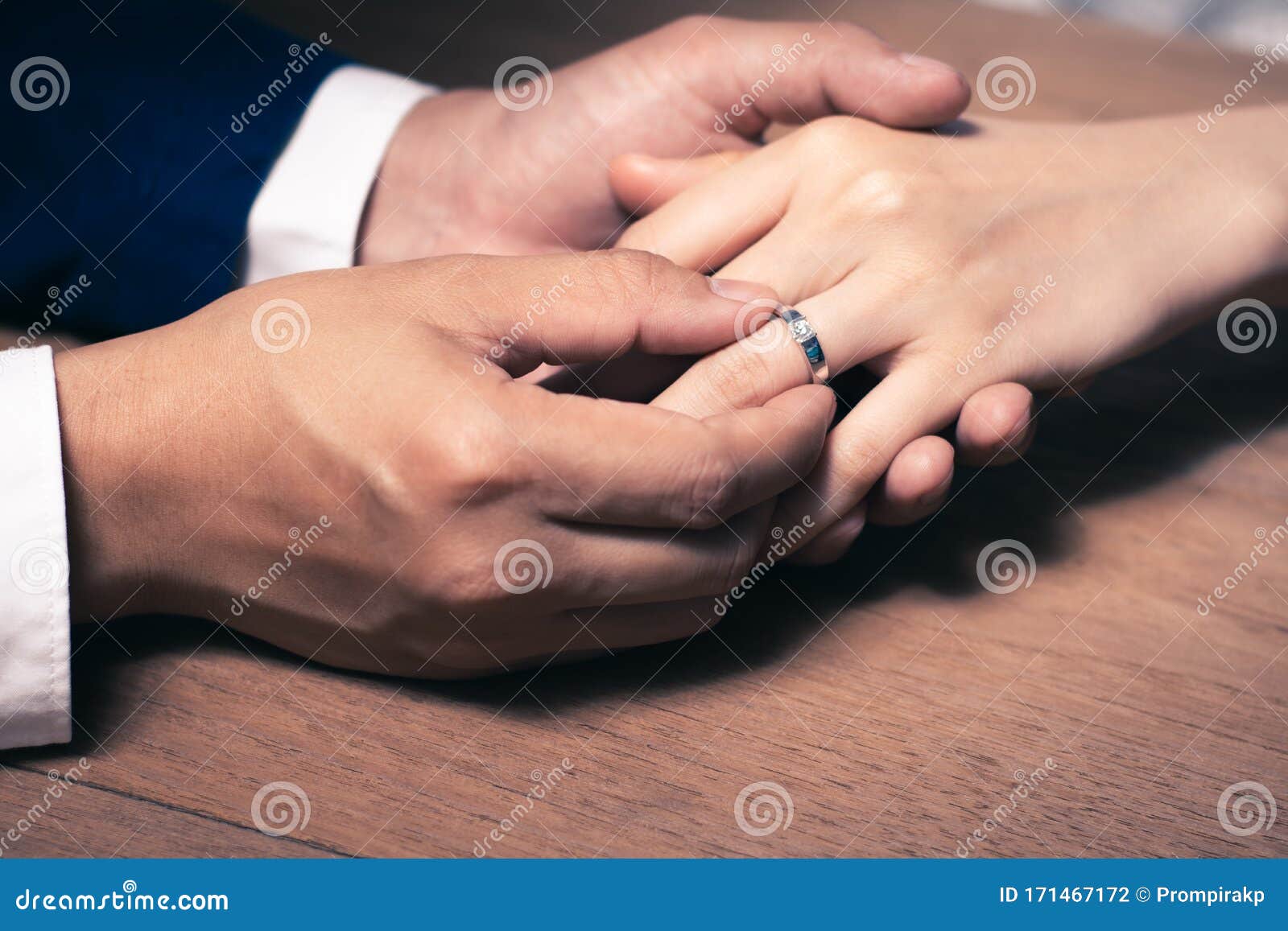 Groom Wearing Wedding Ring To Bride Finger 171467172 