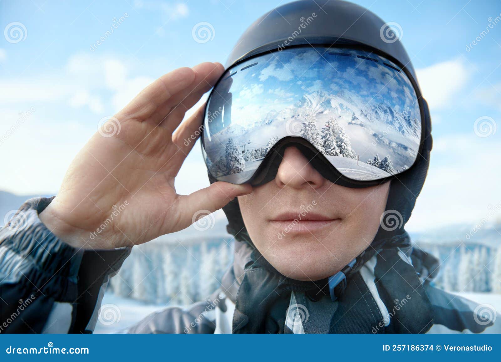 Gros Plan Des Lunettes De Ski D'un Homme Avec Le Reflet Des Montagnes  Enneigées