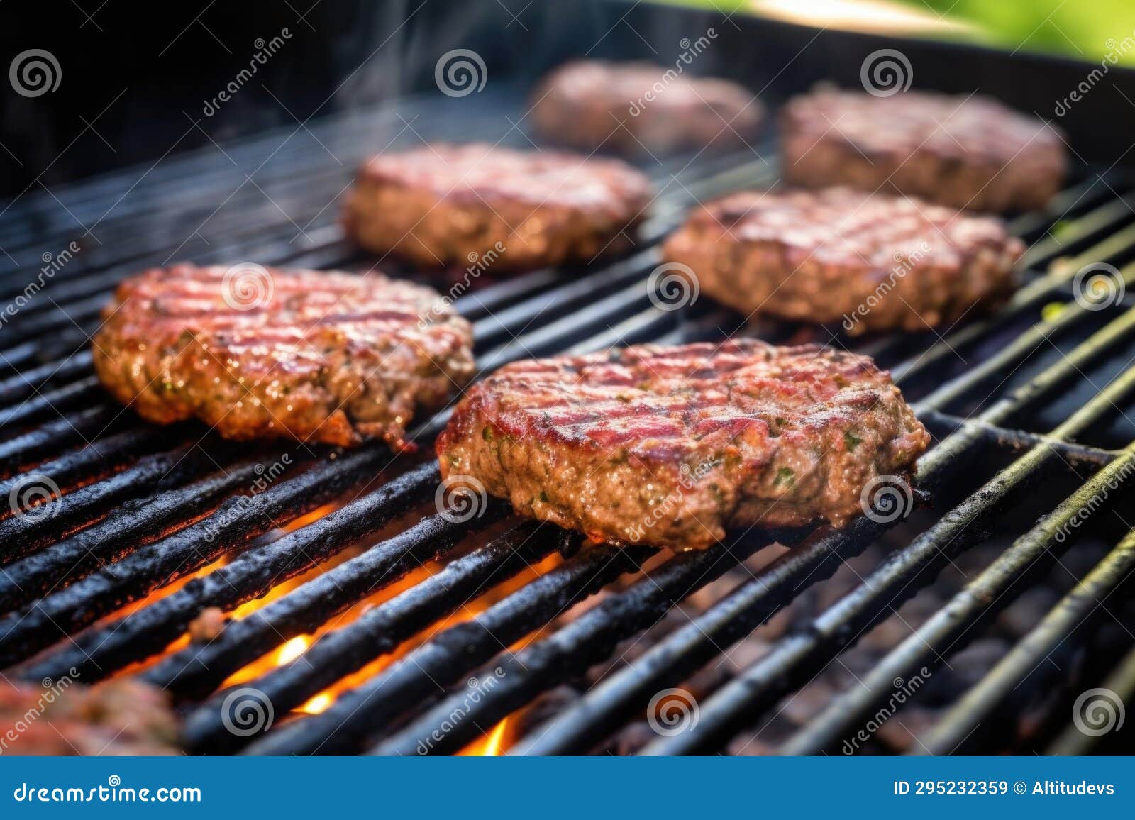 Ground Beef Patties Grilling on an Automatic Grill Stock Image Image