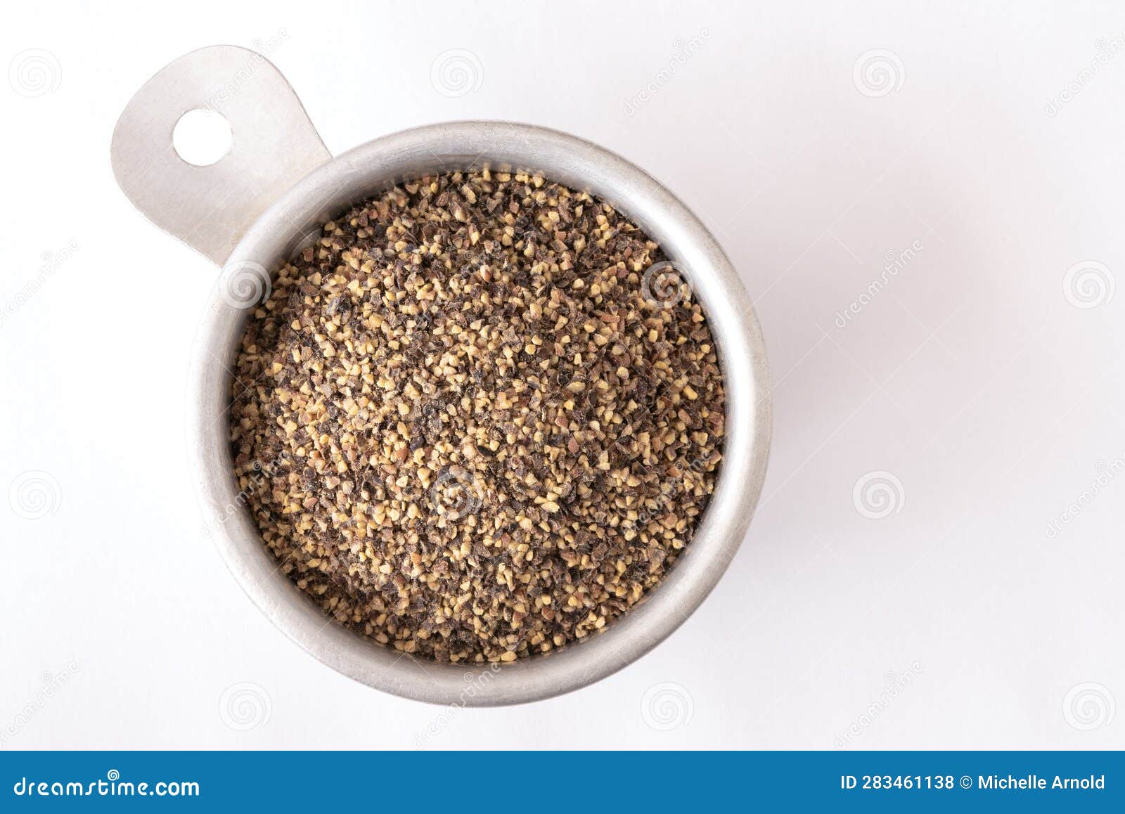 Ground Black Pepper in a Measuring Cup Stock Photo Image of