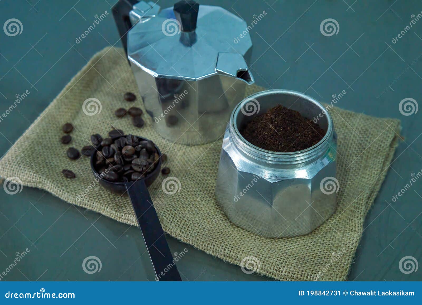 Ground Coffee in Moka Pot and Coffee in a Spoon on a Sack Stock Image