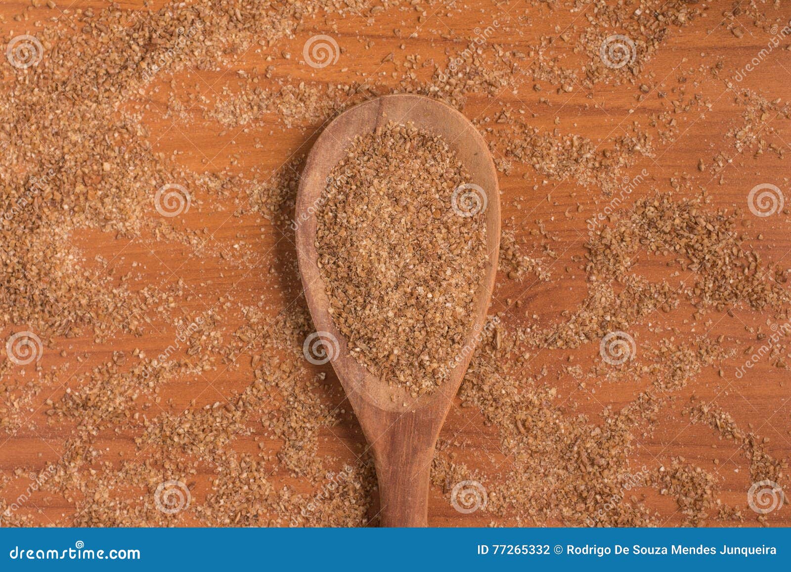 ground wheat into a spoon. trigo para quibe. kibbeh