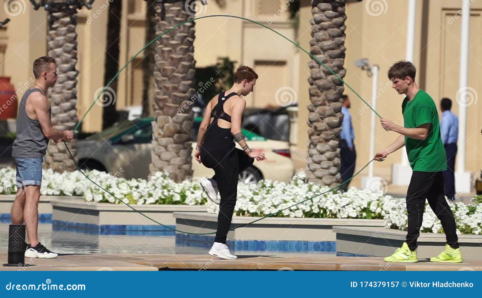 Group of Acrobats Jumping with Double Jump Rope in Dubai Doing