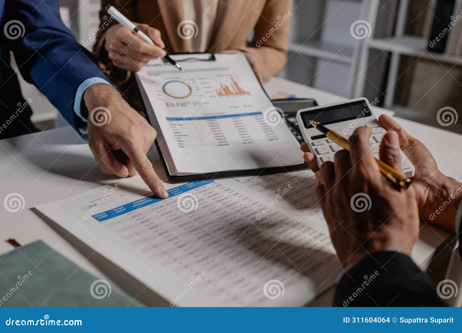 a group of business people are discussing company figures to resolve quarter of the year's losses