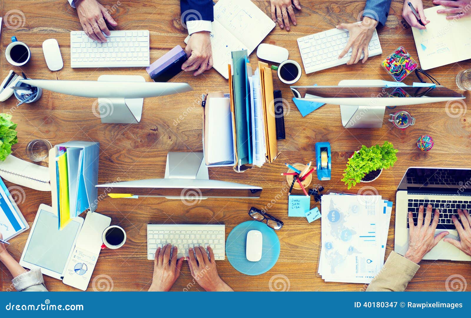 group of business people working on an office desk