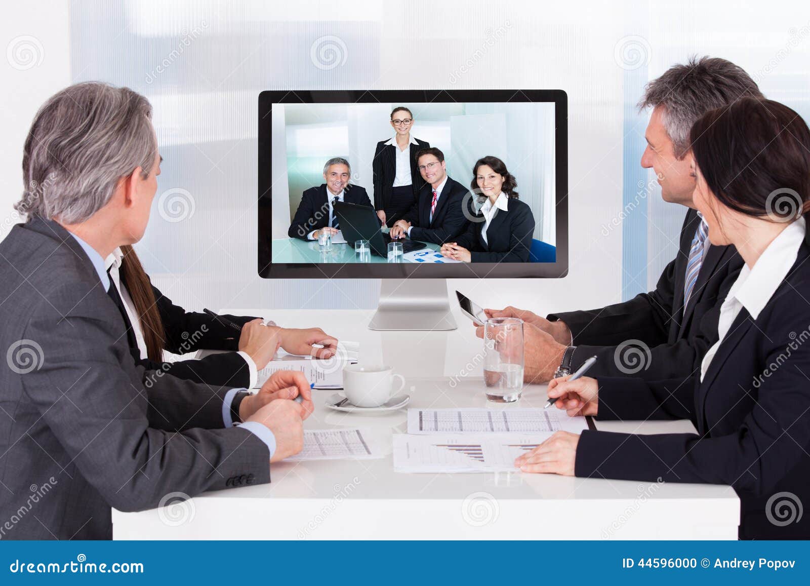 Group of Businesspeople in Video Conference Stock Photo - Image of