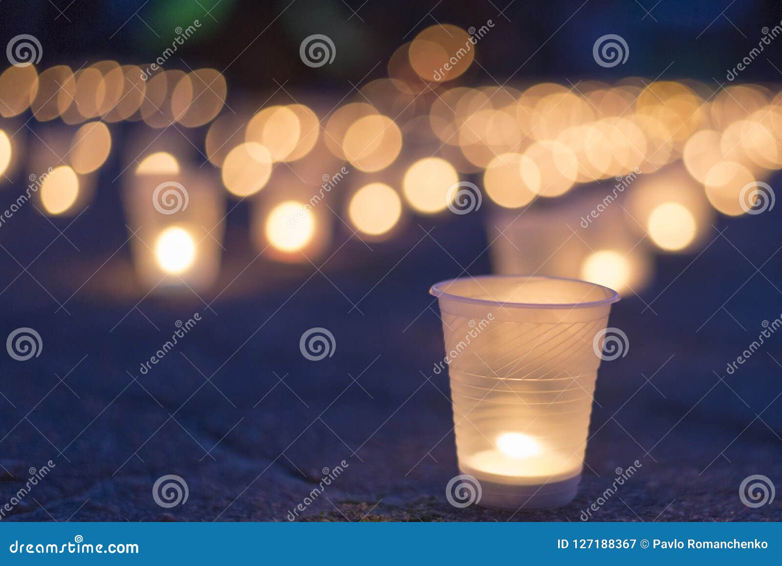 a group of candles burning in street. day of remembrance for the bereaved