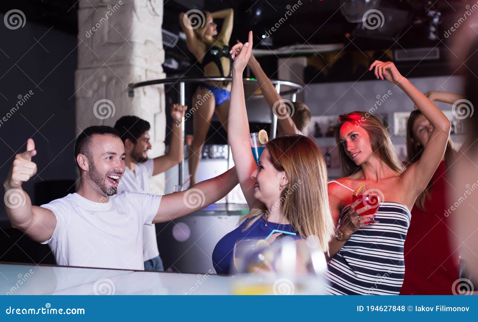 Group of Cheerful People Clubbing in the Club Stock Photo - Image of ...