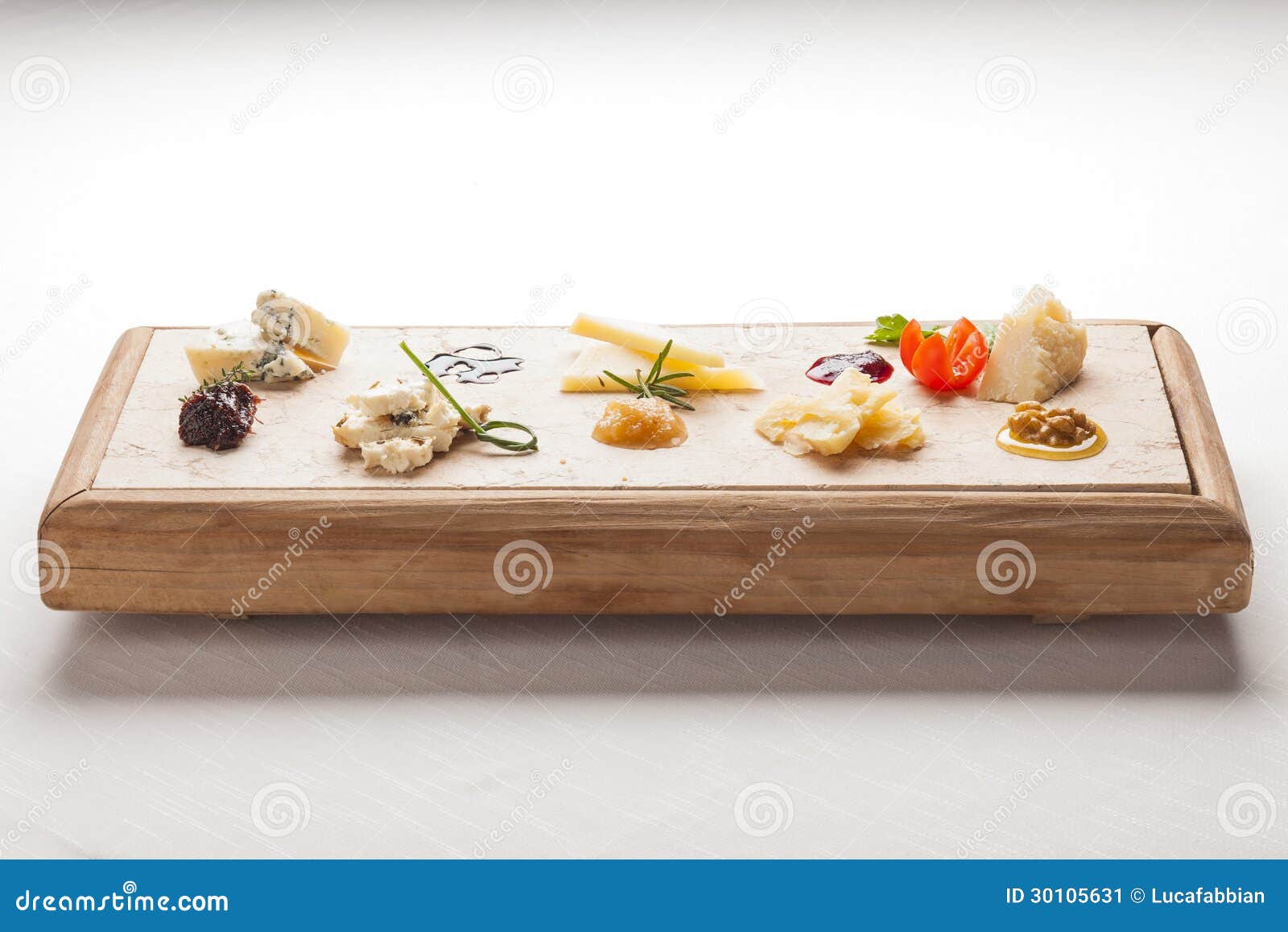 cheeseboard with italian cheeses ready for degustation. gourmet