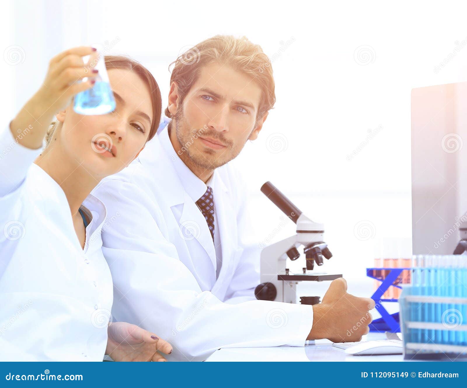Team of Biologists Researchers Working in Laboratory Stock Image