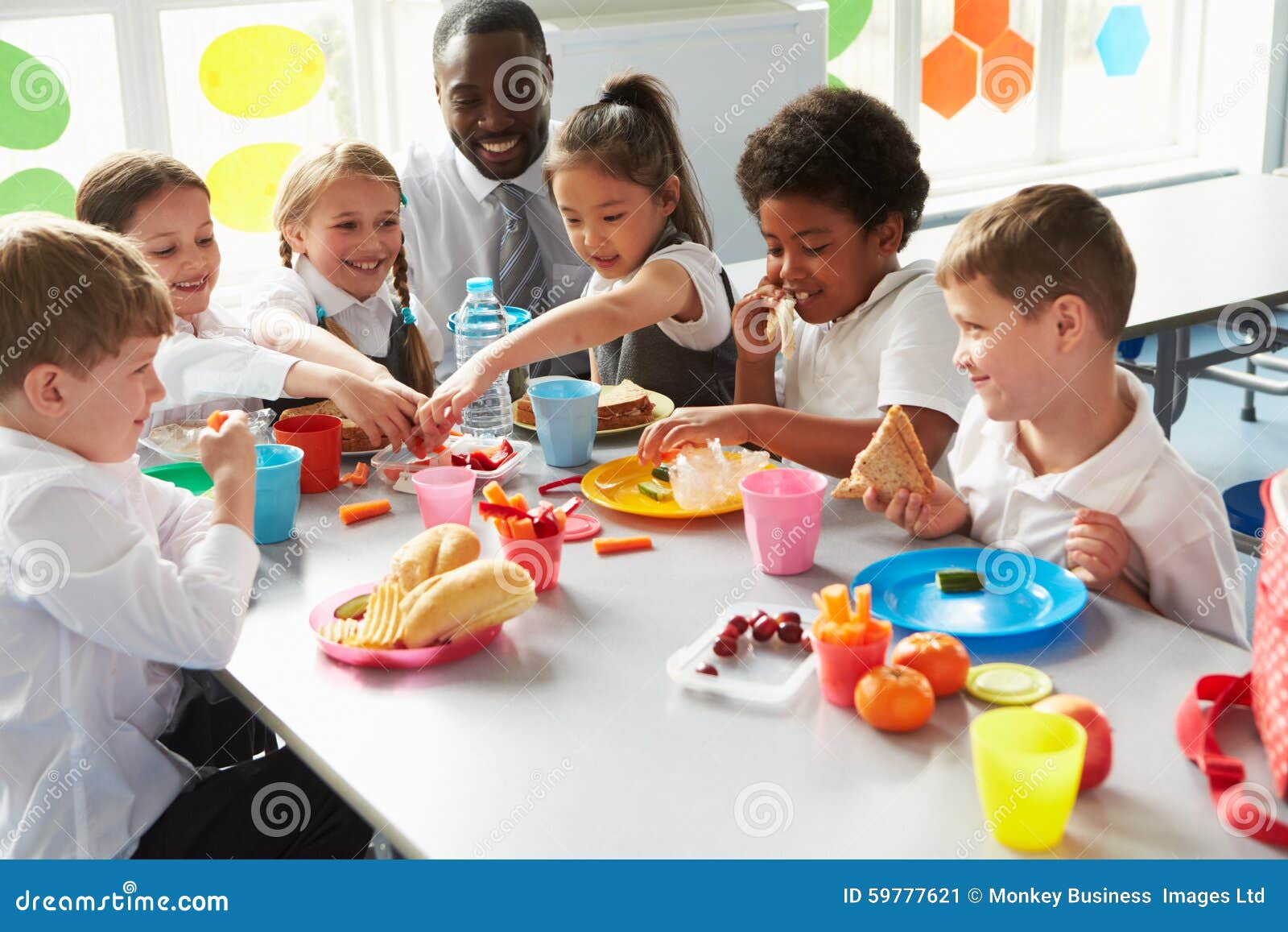 https://thumbs.dreamstime.com/z/group-children-eating-lunch-school-cafeteria-59777621.jpg