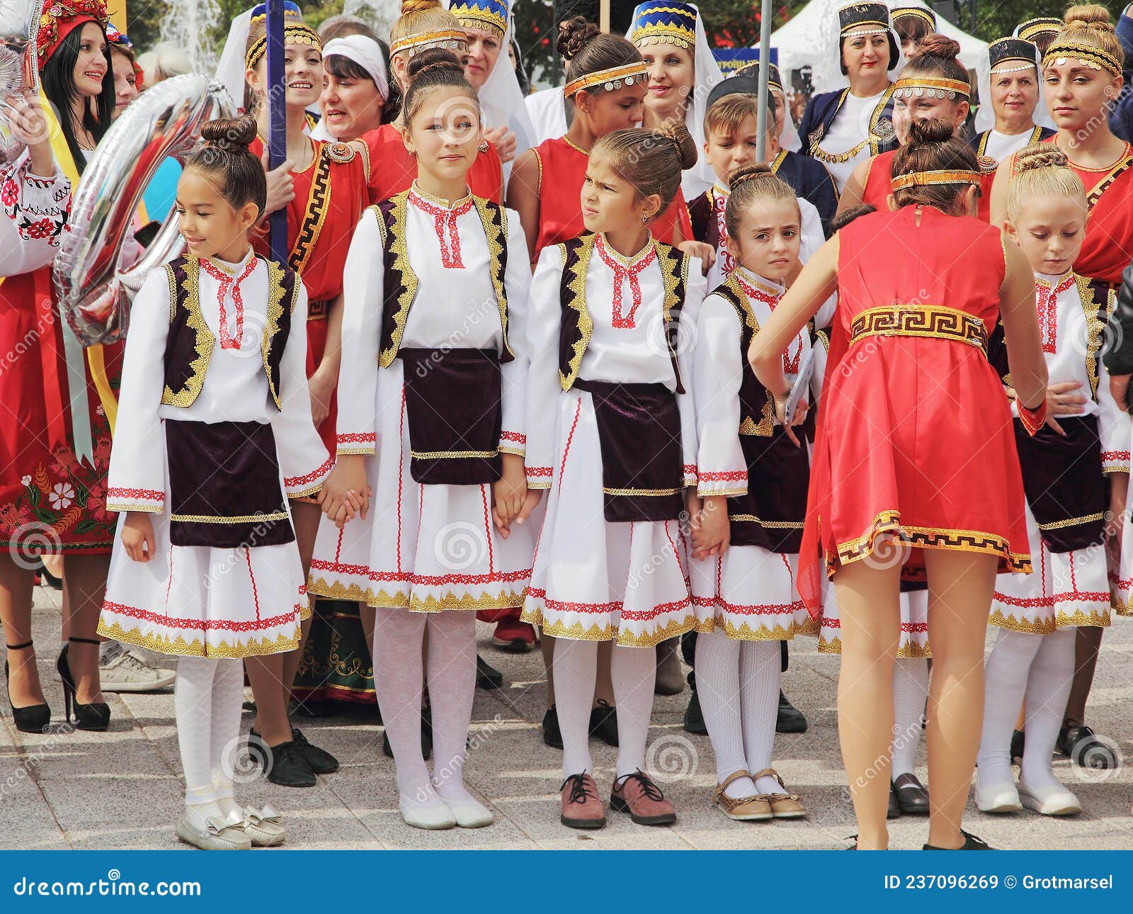 A Group of Children in National Greek Clothes Participating in the Mega ...