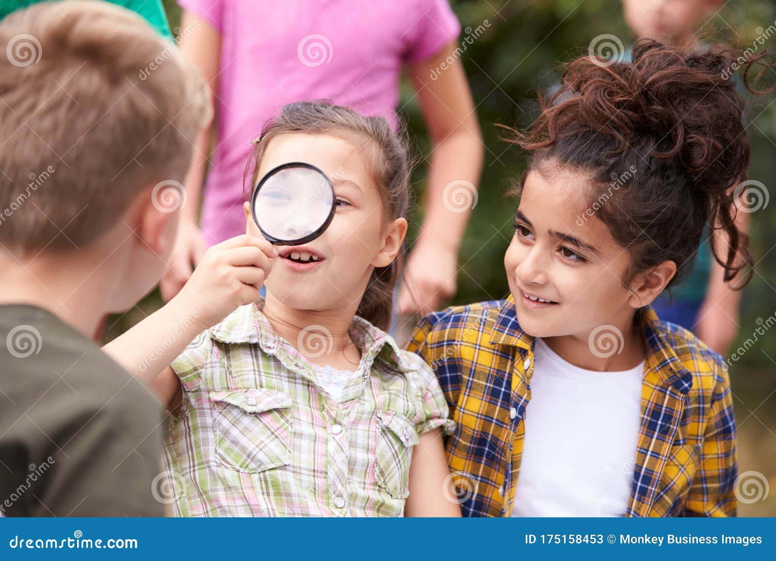 Group of Children on Outdoor Activity Camping Trip Looking at Map