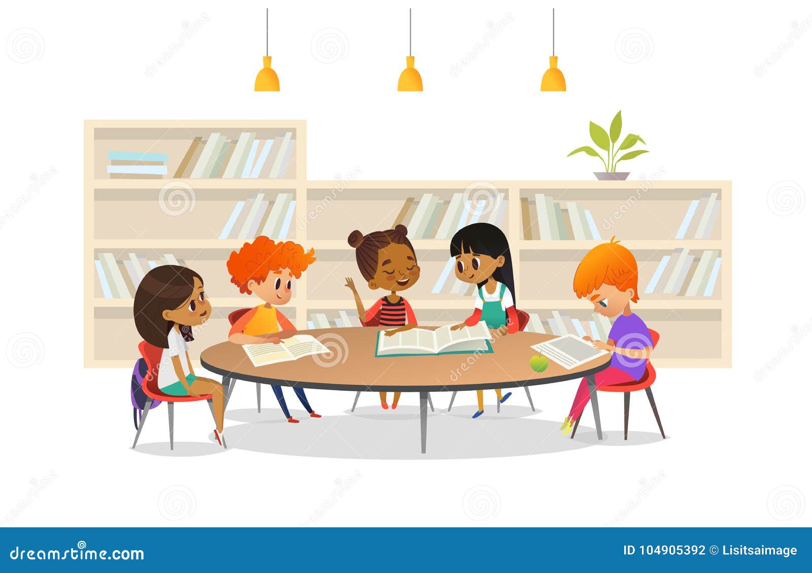 group of children sitting around table at school library and listening to girl reading book out loud against bookcase or