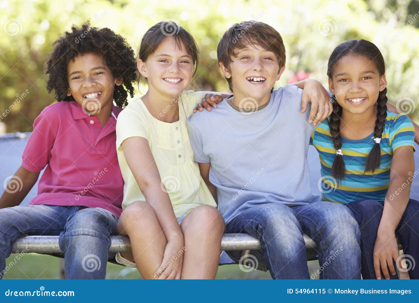 Group of Children Sitting on Edge of Trampoline Together Stock Image ...