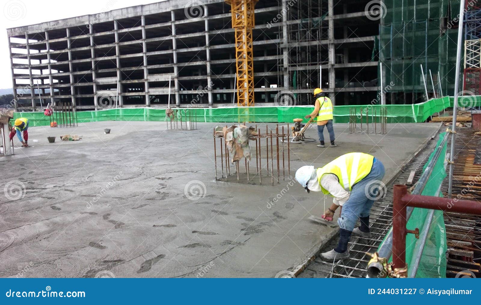 Group of Construction Workers Working at the Construction Site. the