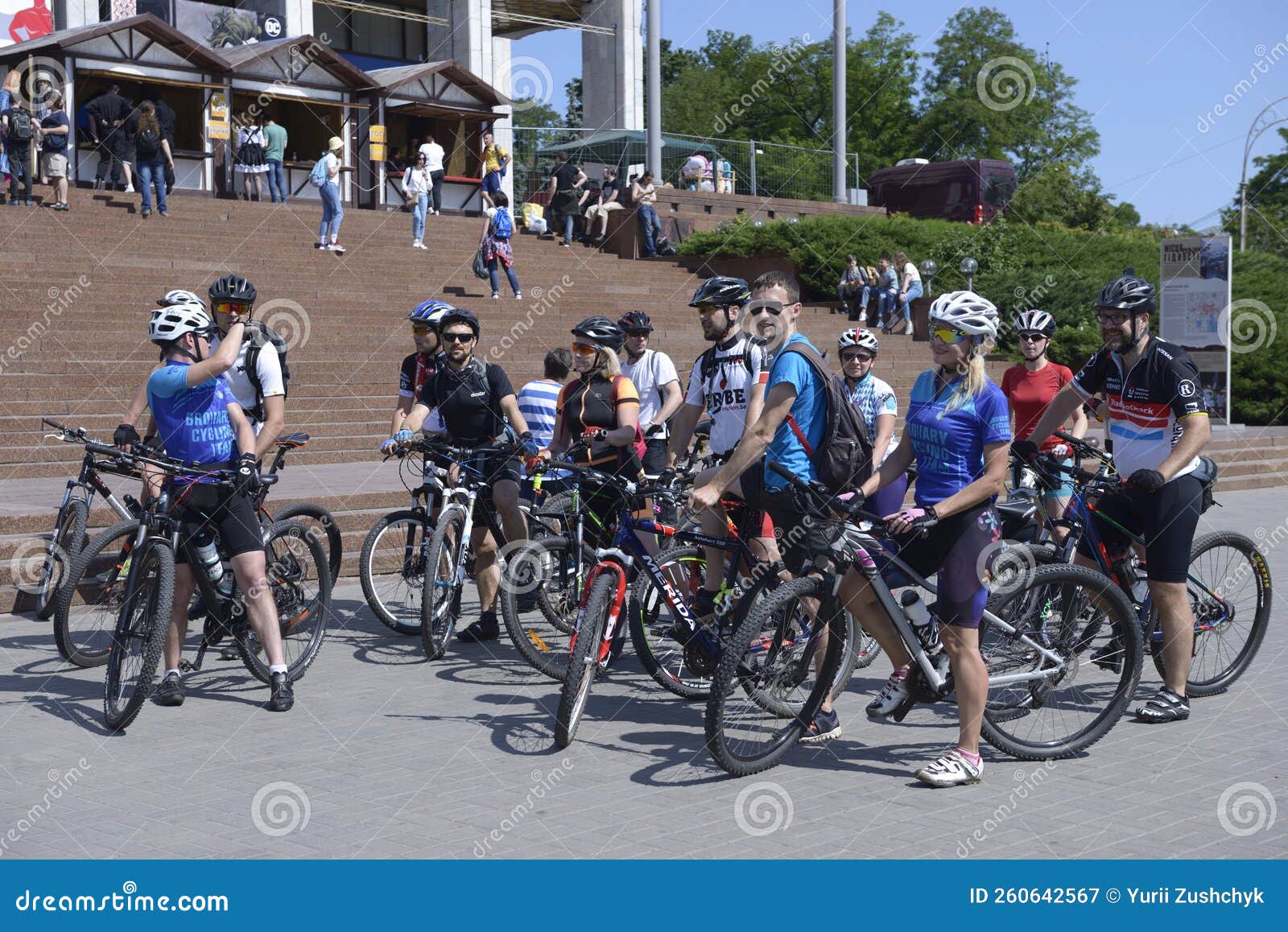 Group of Cyclists Standing in the Middle of the Street Road Cycle Race Group of Cyclists Standing in the Middle of the Street Road Cycle Race