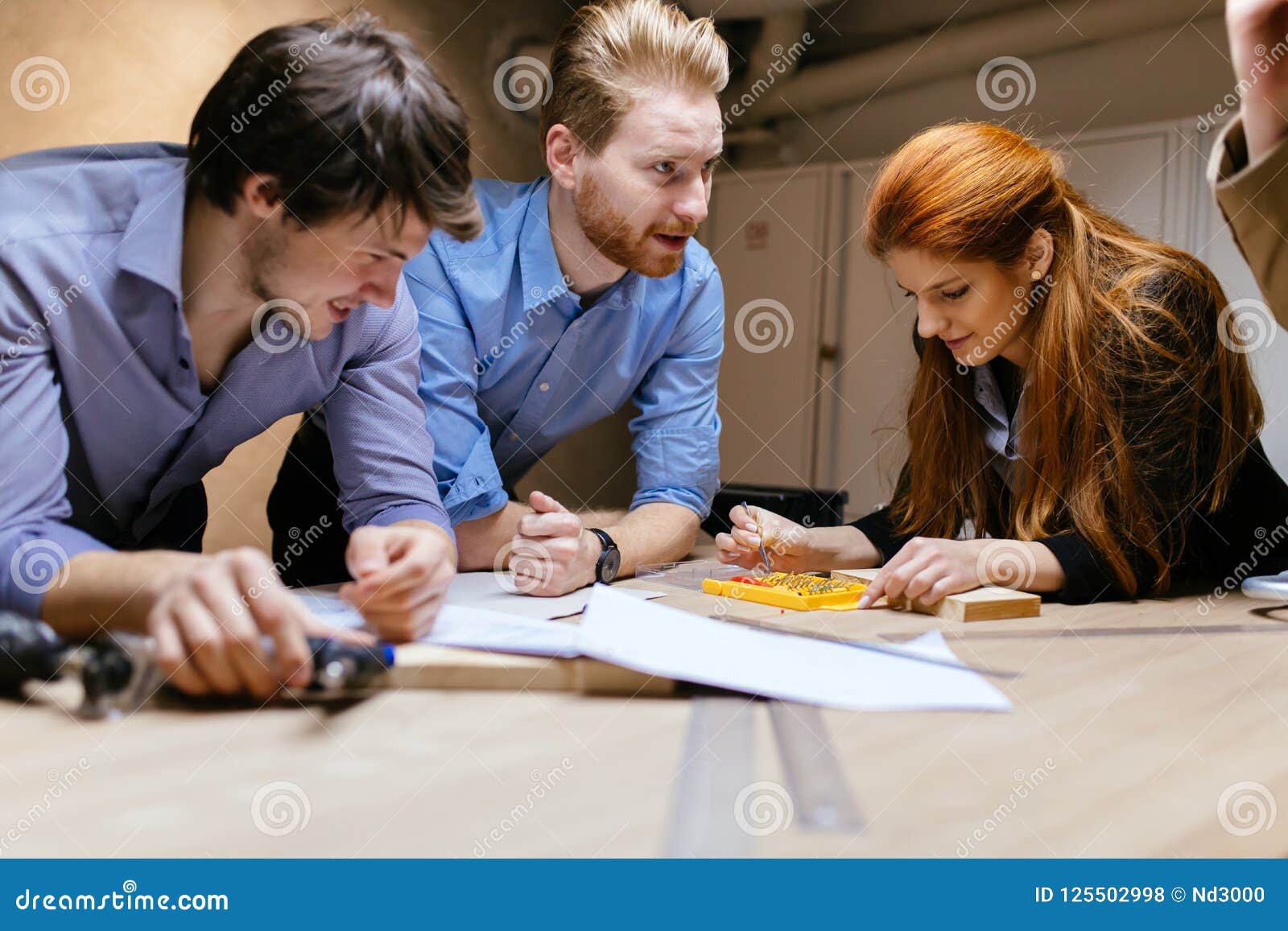 Group of Designers Working on a Project Stock Photo - Image of ...