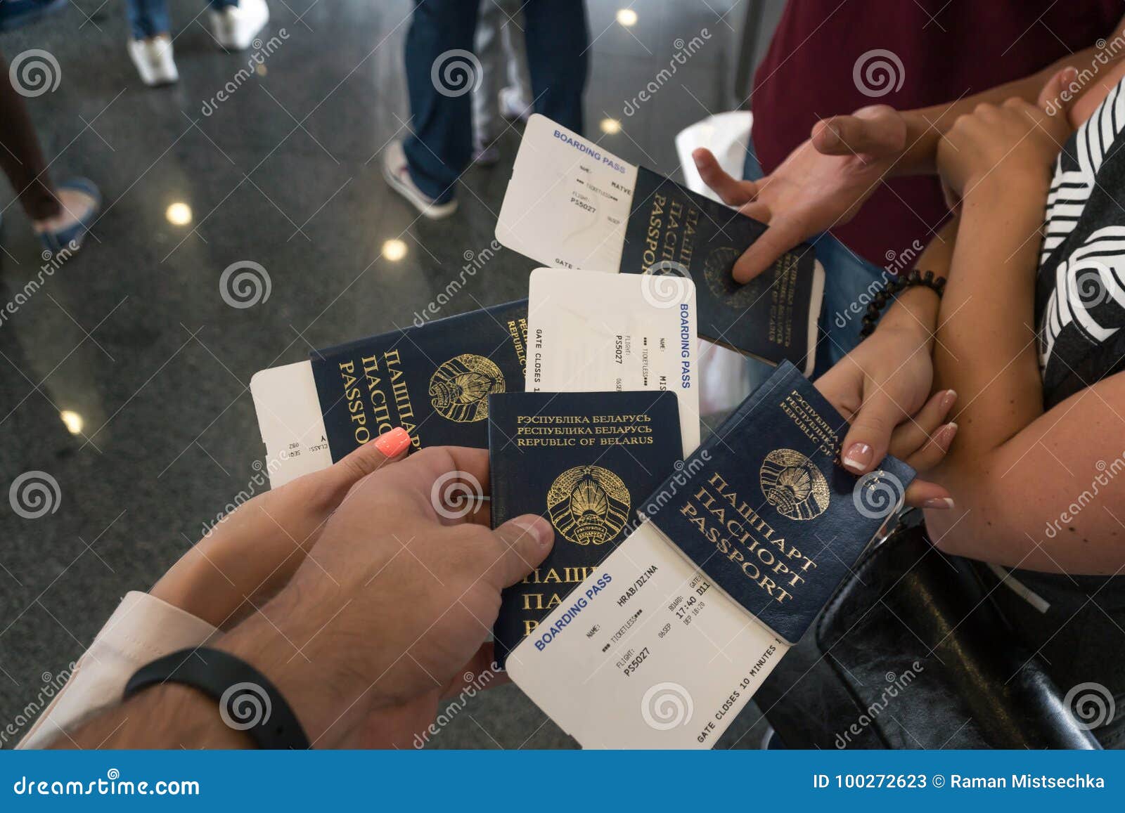 Group of Diverse Friendship Hands Show Passport with Plane Ticket
