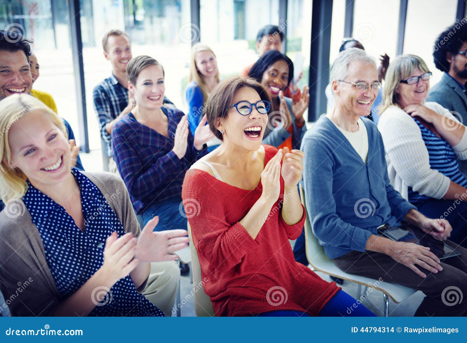 group of diverse people in seminar