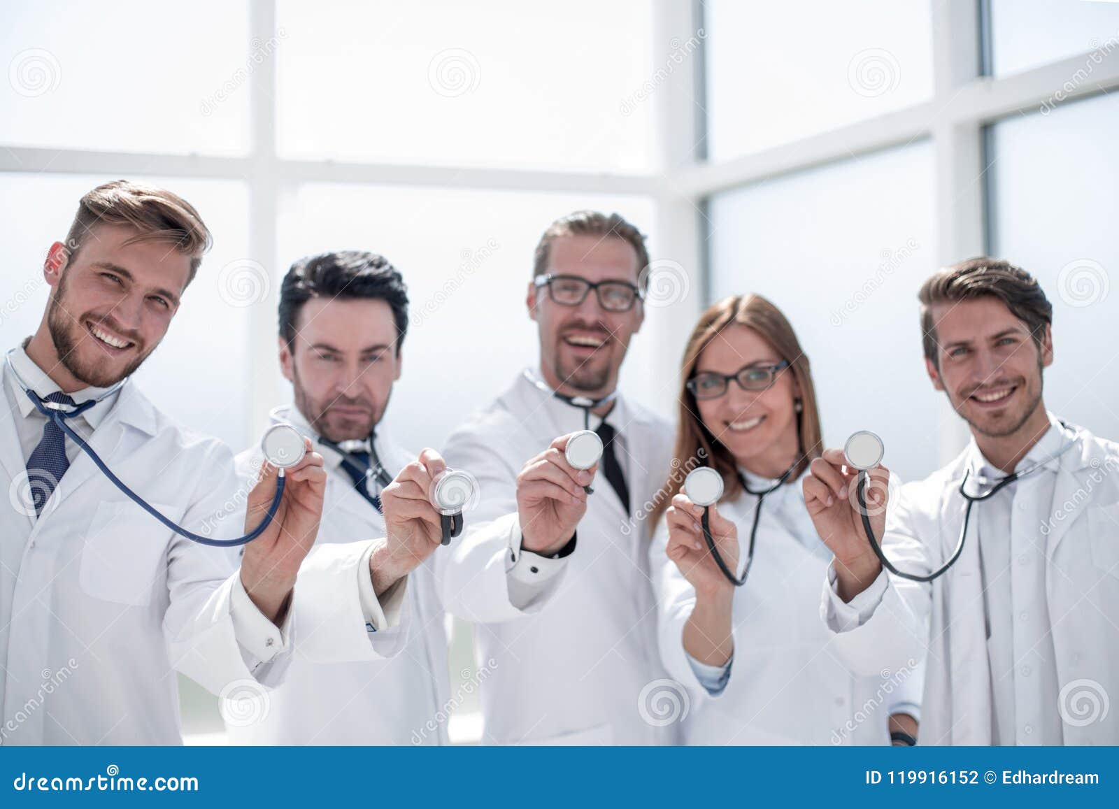 Group of Doctors Hold Their Stethoscopes Stock Photo Image of
