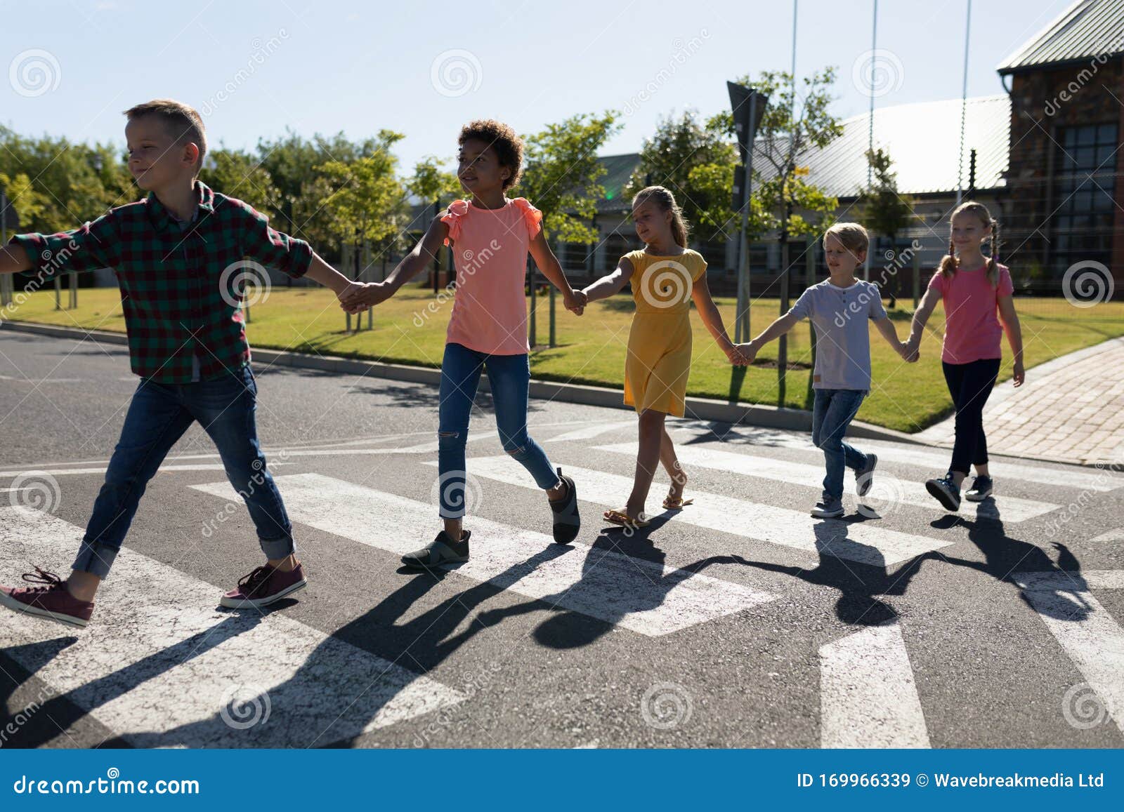 Group Of Elementary School Pupils Crossing A Road Stock Image Image