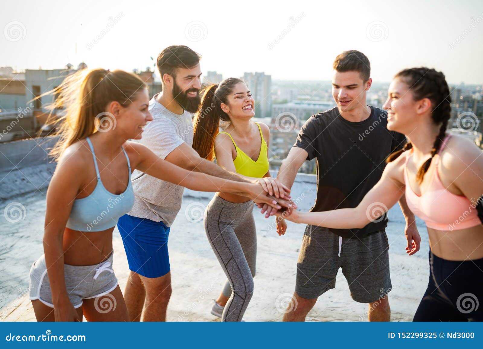 Group of Happy Fit Friends Exercising Outdoor in City Stock Image ...