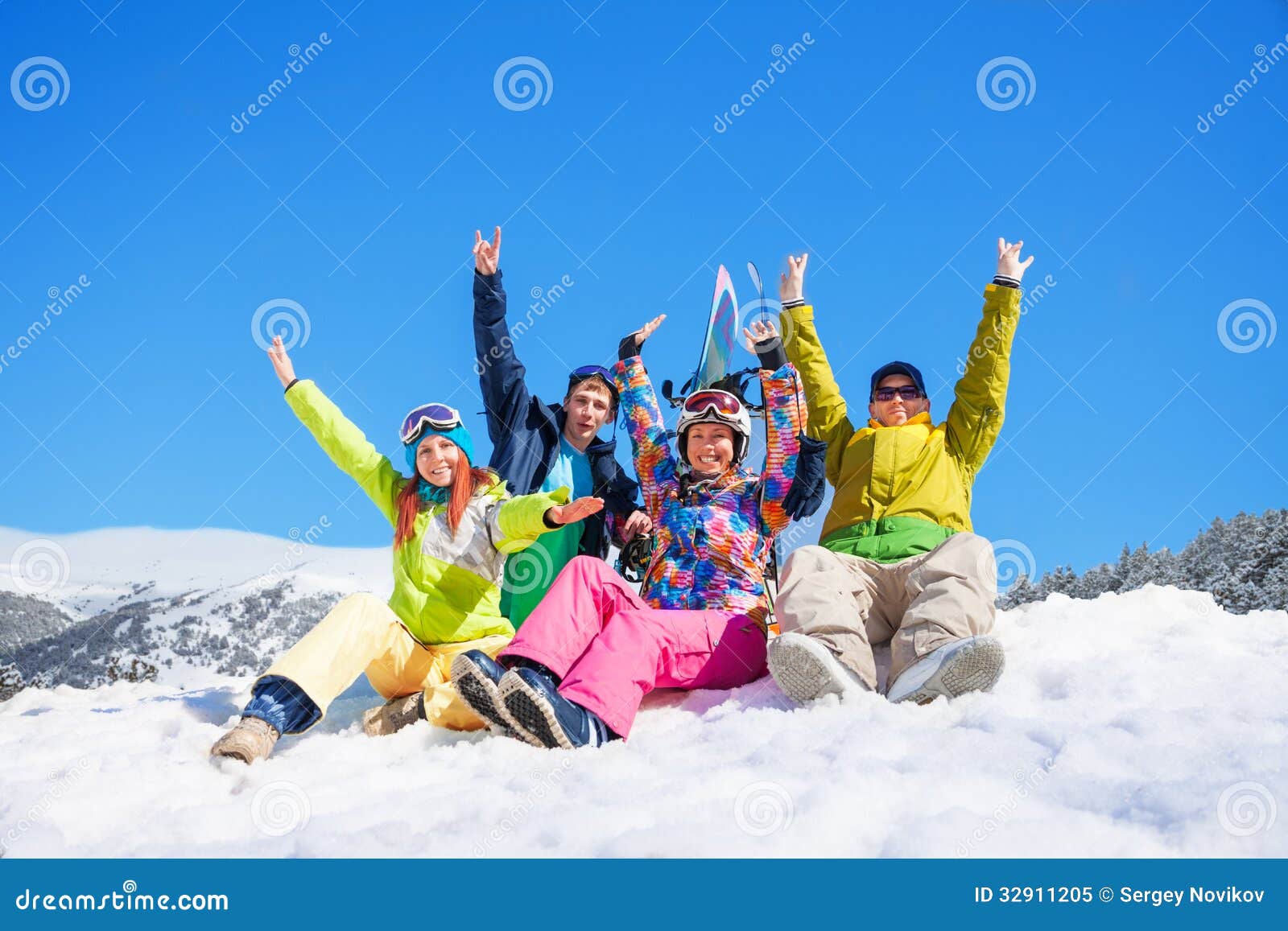 Group of four snowboarders stock image. Image of girl - 32911205