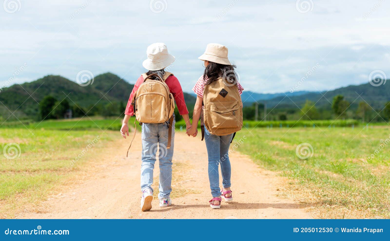 group friend children travel nature summer trips.  family asia people tourism walking on road happy and fun explore