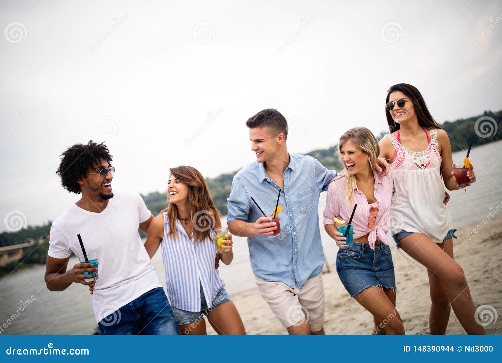 Group of Friends Having Fun on the Beach. Summer Holidays, Vacation and ...