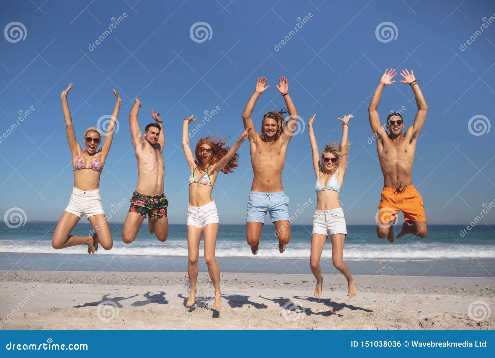 Group of Friends Jumping Together on the Beach Stock Photo Image of jumping, male 151038036