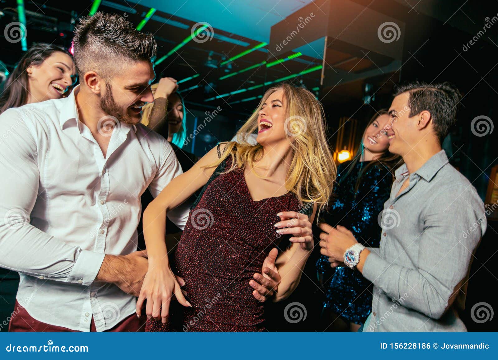 Group of Friends Partying in a Nightclub Stock Photo - Image of dark ...