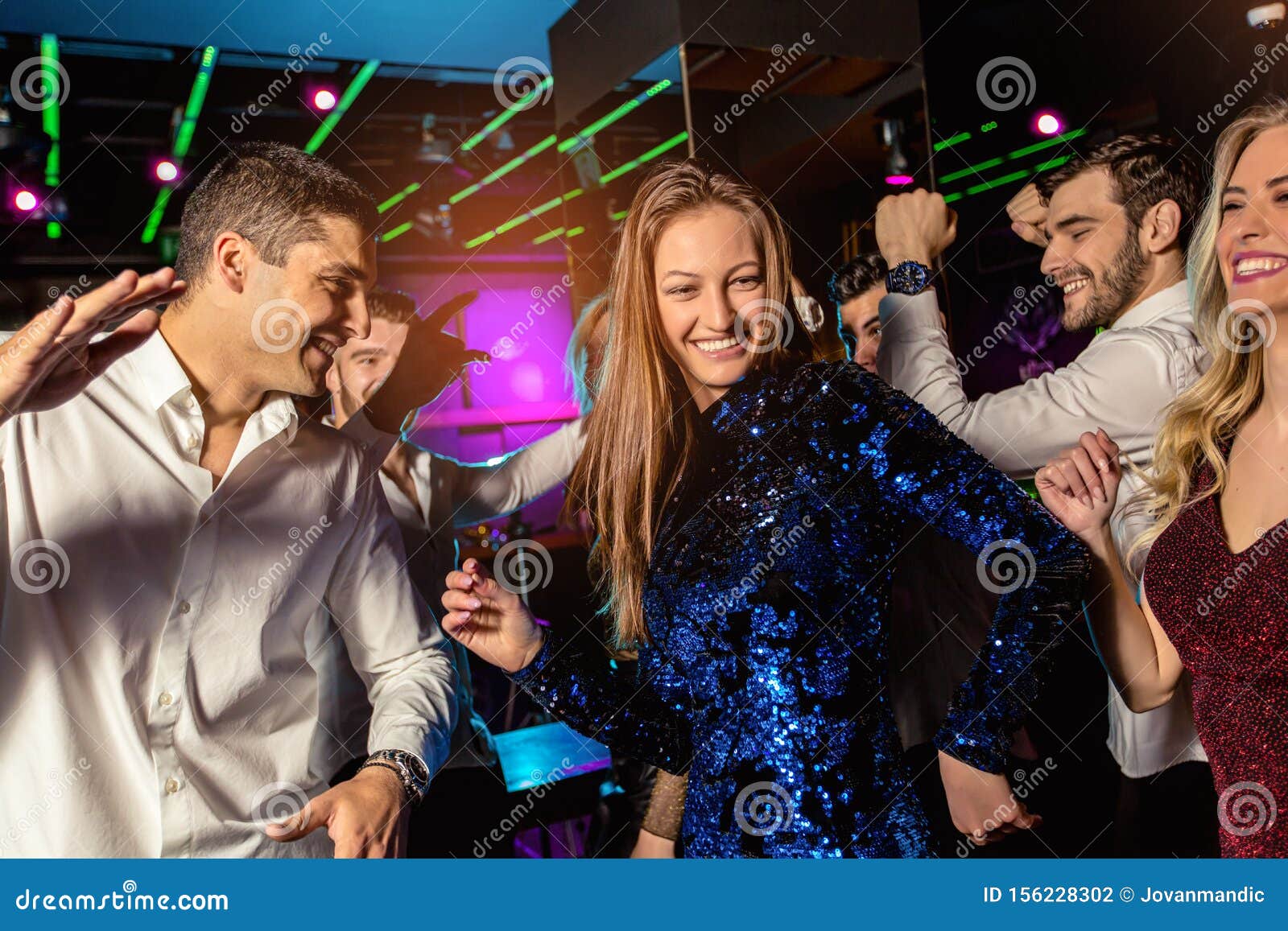 Group of Friends Partying in a Nightclub Stock Photo - Image of females ...