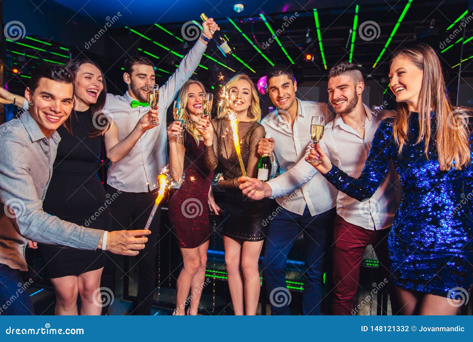 Friends Partying in a Nightclub and Toasting Drinks Stock Photo - Image ...