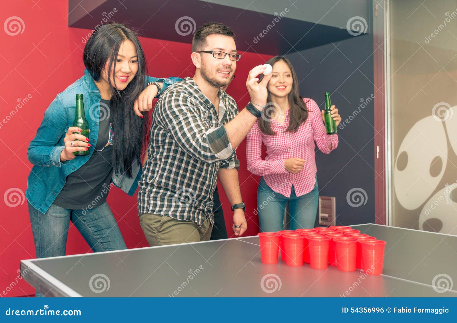 Group of Friends Playing Beer Pong Stock Photo Image of cheerful