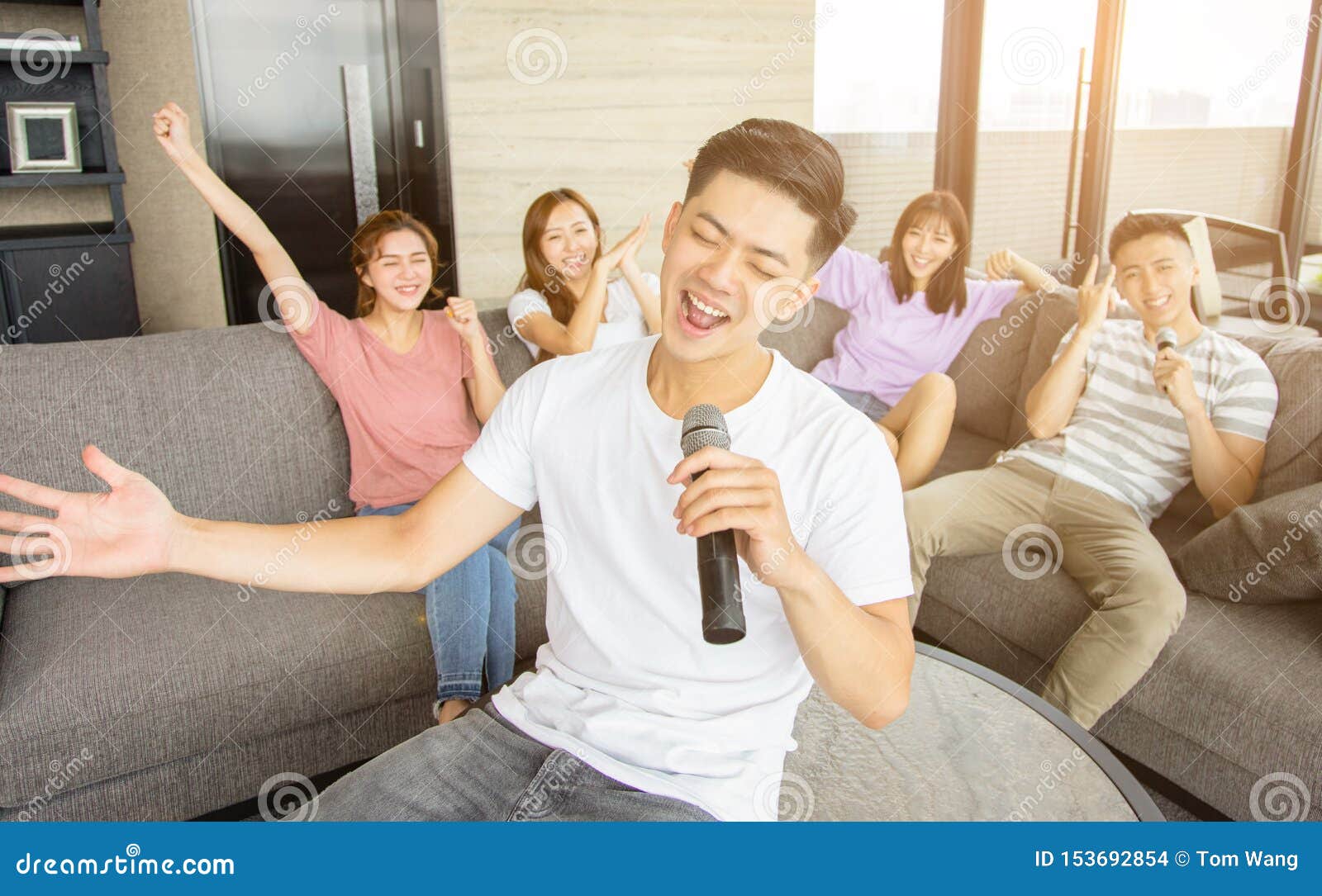 Group of Friends Playing Karaoke at Home Stock Photo Image of