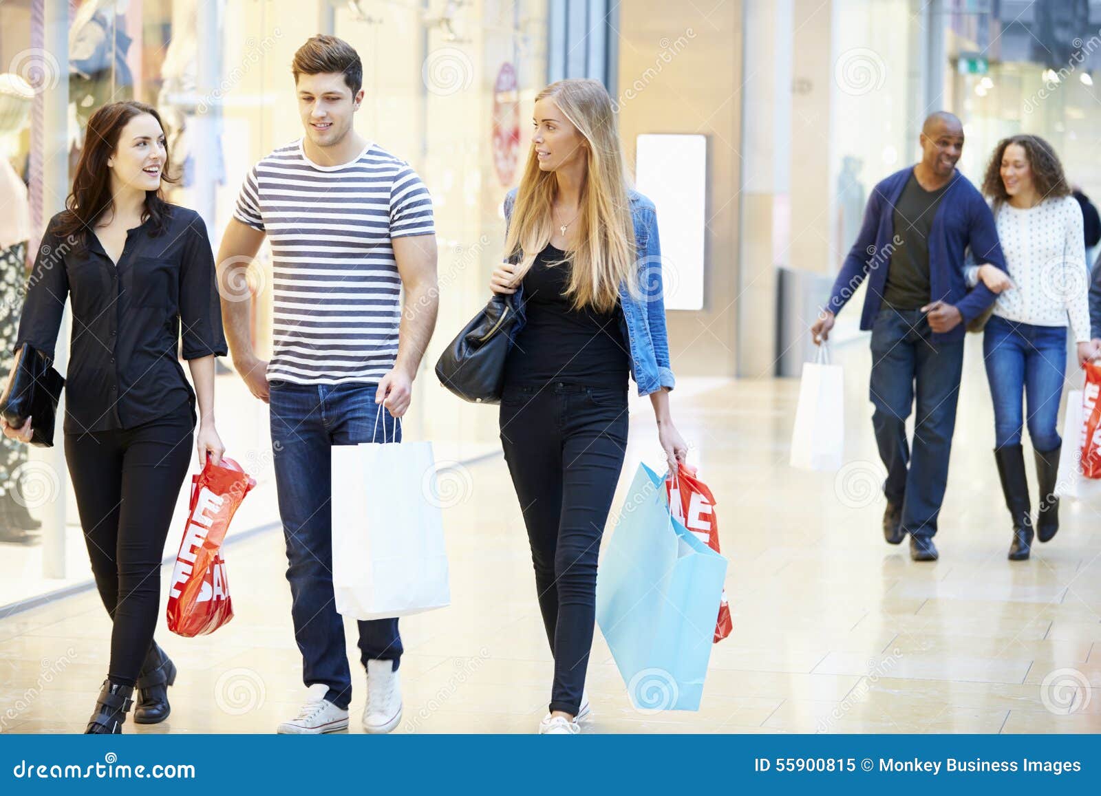 Group of Friends Shopping in Mall Together Stock Image Image of