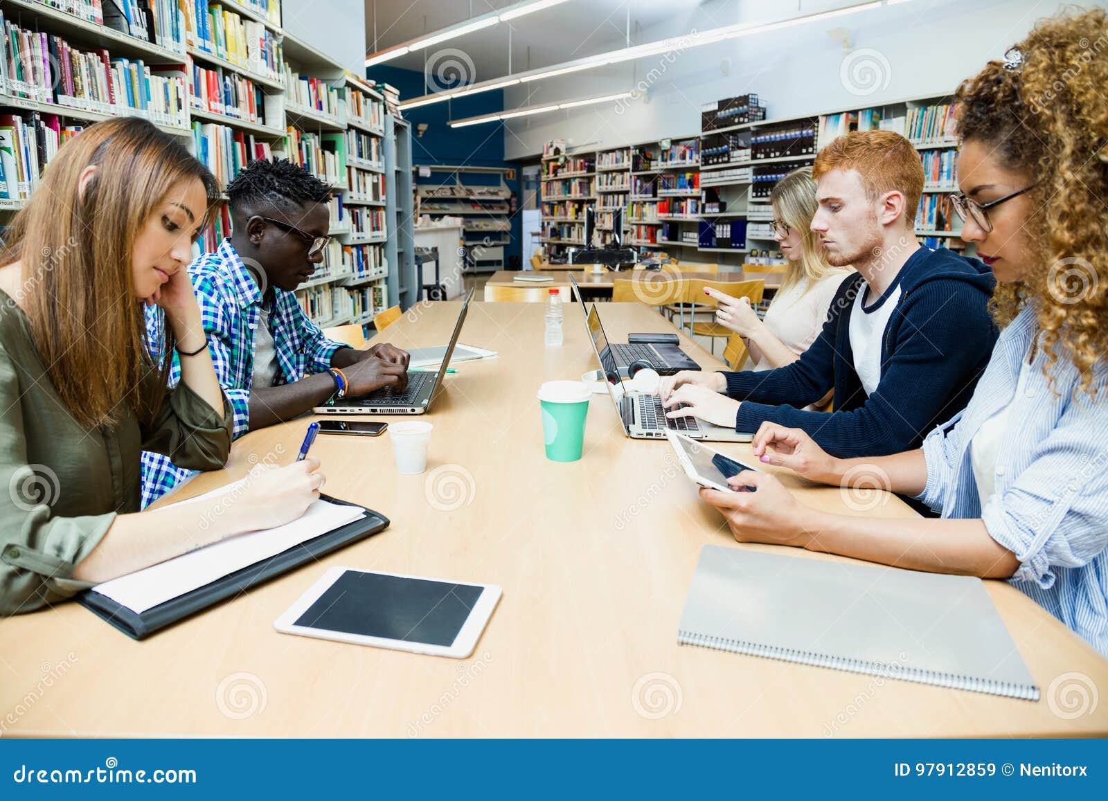 Group of Friends Studying in a University Library. Stock Image Image