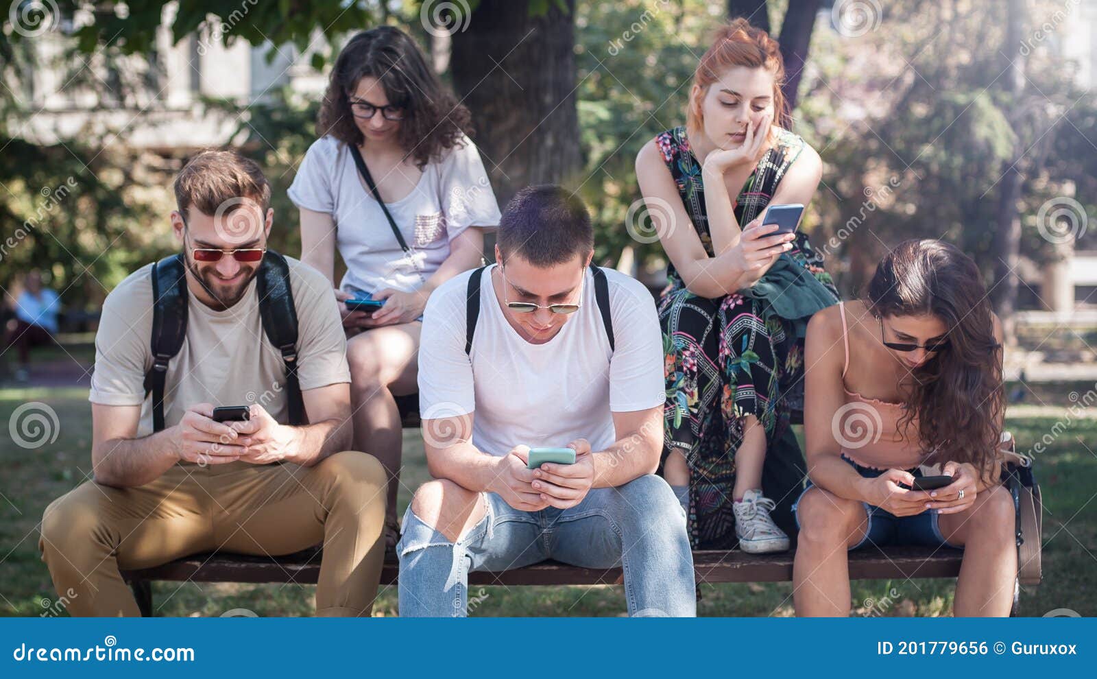 group of friends using smartphones. emotional isolation and technology depresion