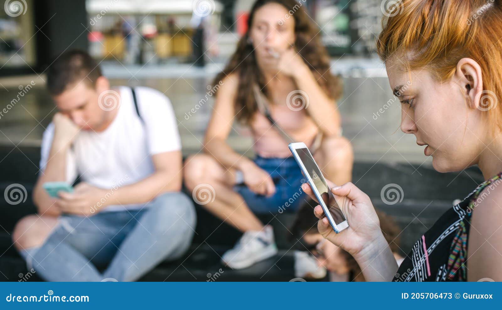 group of friends using smartphones. emotional isolation and technology depresion