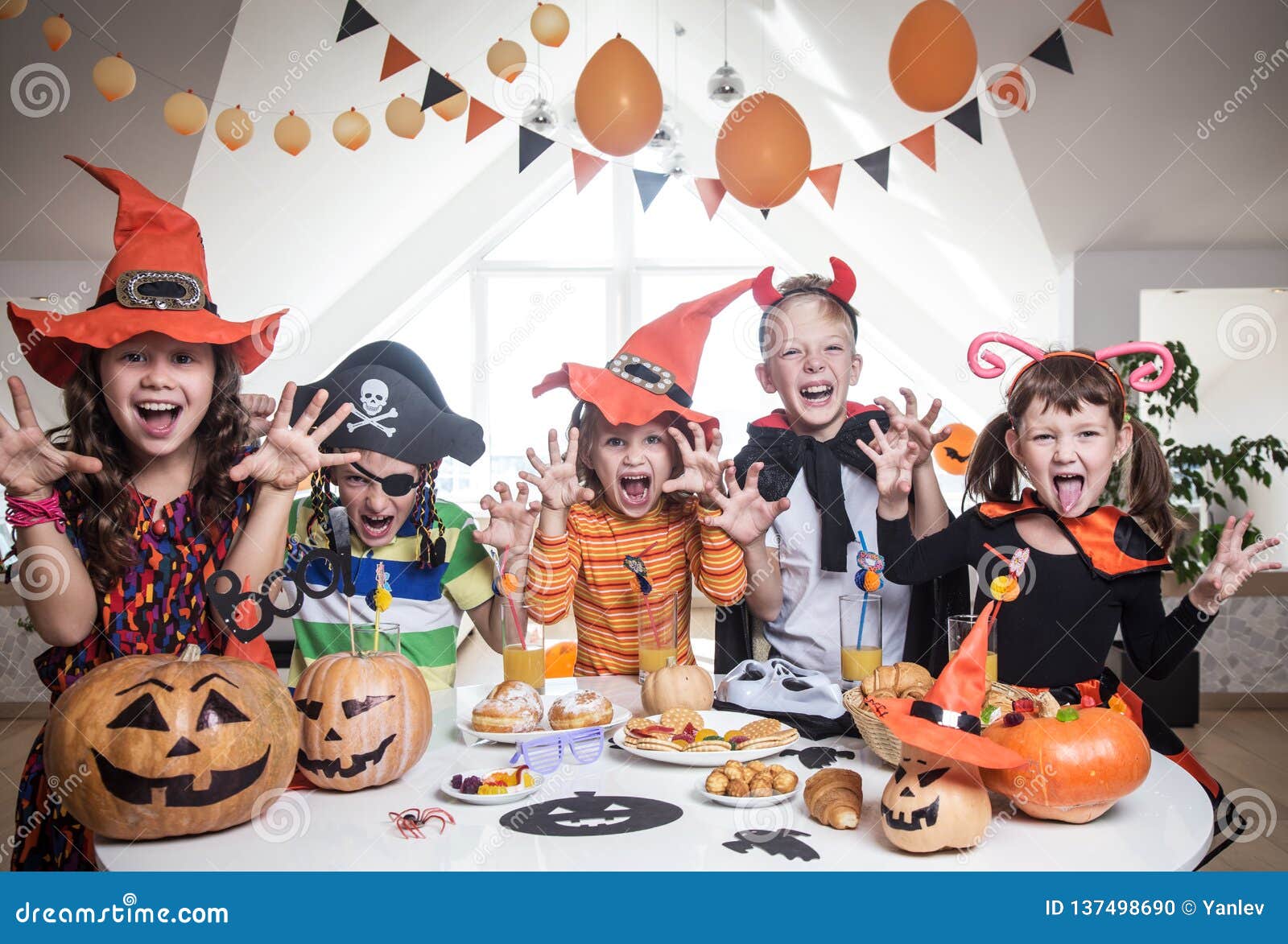 Kids in Halloween party stock photo. Image of cheerful - 137498690