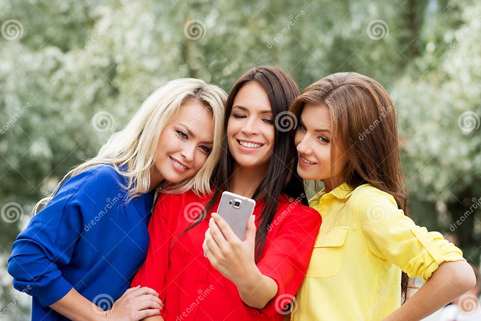 Group Of Gorgeous Girls Taking Selfies In The Park Stock Image Image 