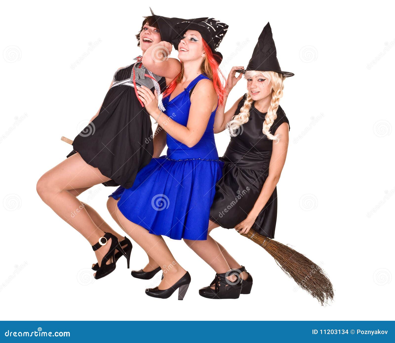 Group Halloween Witch in Costume Fly on Broom. Stock Photo Image of