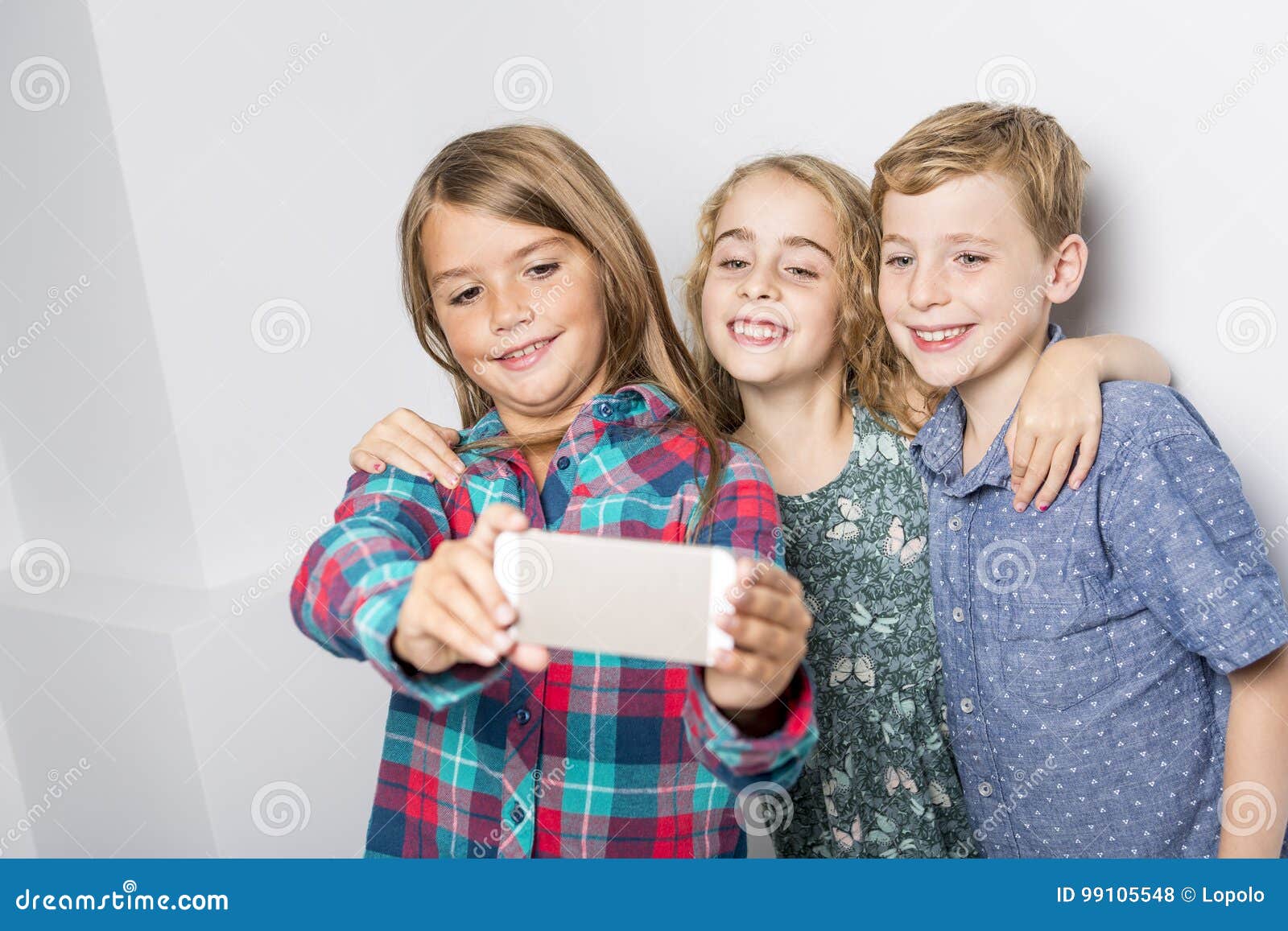 Group of Happy Children in Studio Gray Background Stock Photo - Image ...