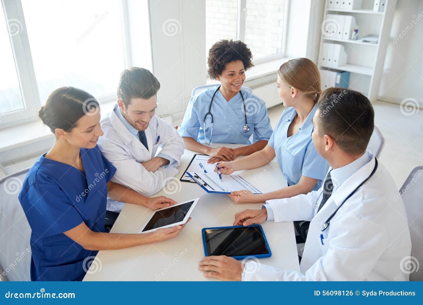 Group Of Happy Doctors Meeting At Hospital Office Stock ...