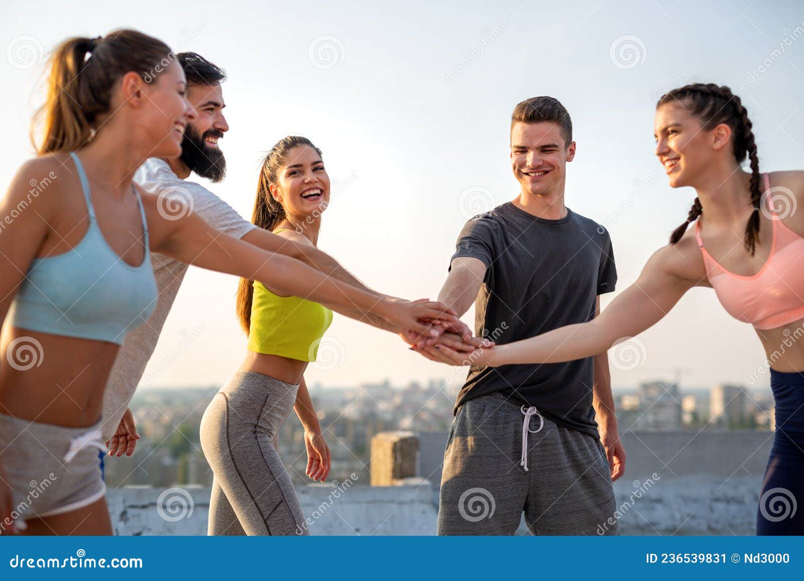 Group of Happy Fit People Friends Exercising Together Outdoor Stock ...