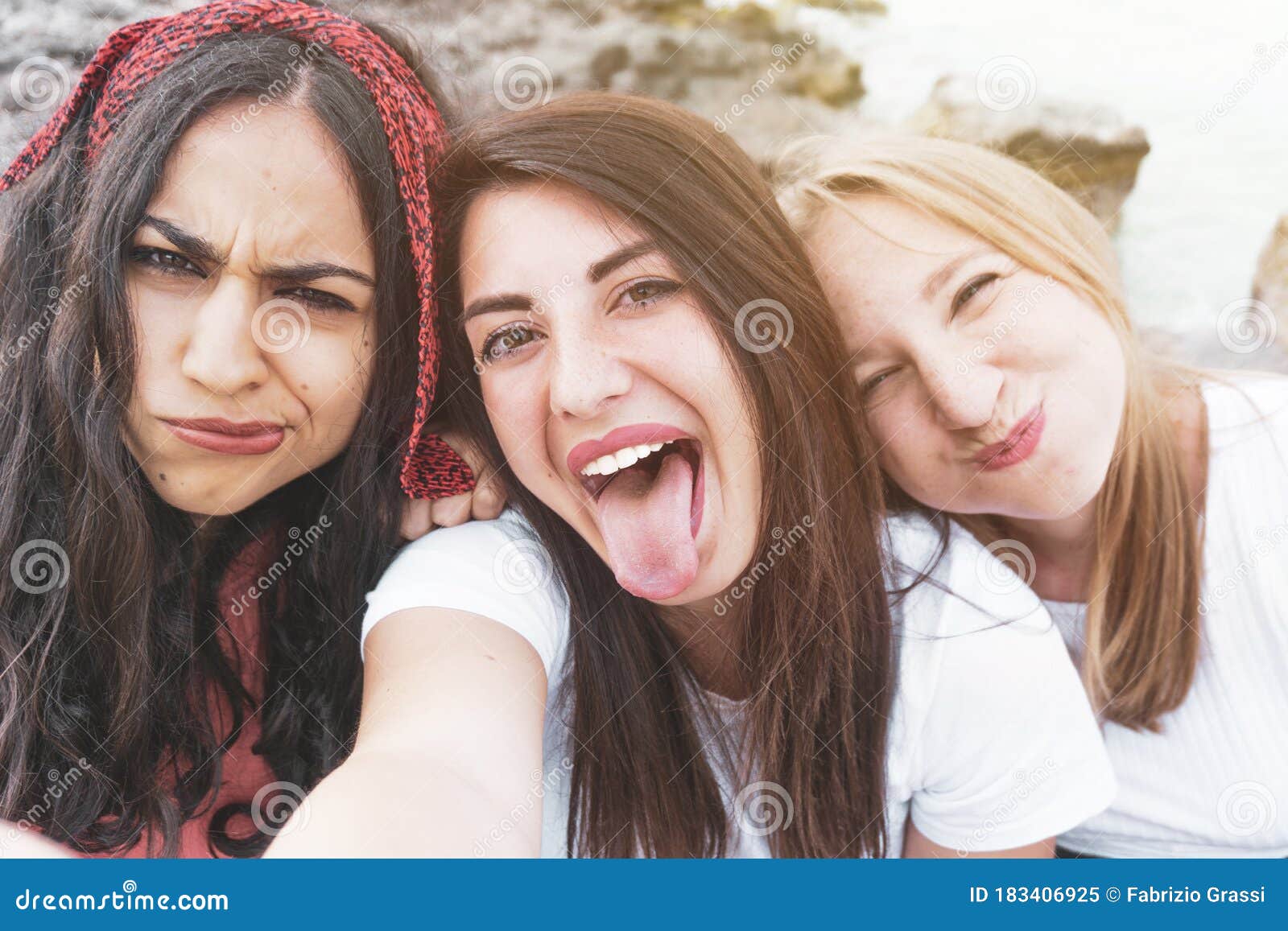 Group Of Happy Multiracial Friends Having Fun Taking A Funny Selfie 